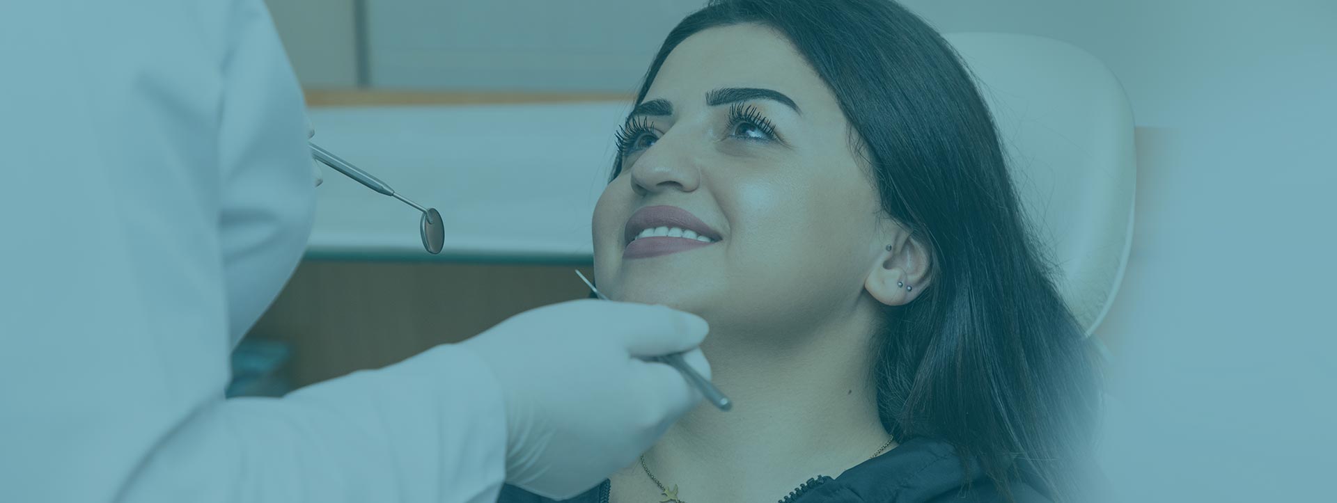 Woman having cosmetic dentistry at the dental